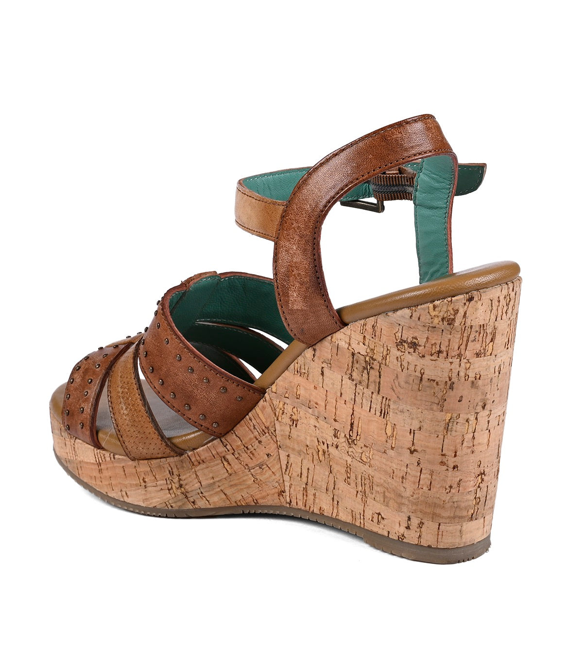 
                  
                    High-heeled platform wedge heel sandal with brown and green full-grain leather straps and a cork platform, isolated on a white background from Roan's Different.
                  
                