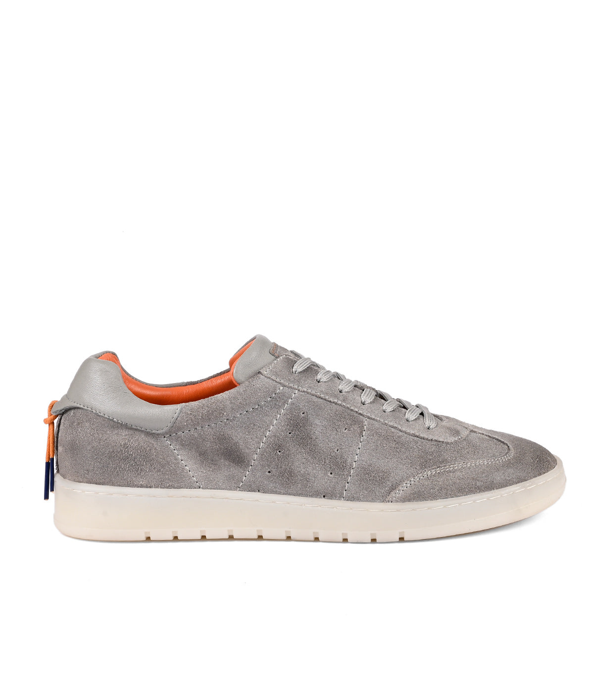 A side view of a gray soft suede leather Attitude sneaker by Roan with white soles and orange lining against a white background.