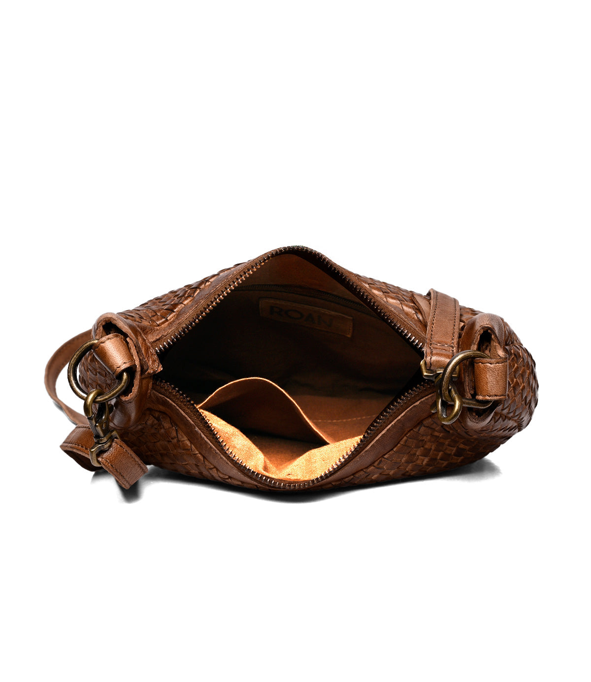
                  
                    The Roan Agenda is a brown woven leather crossbody clutch with a zipper, revealing an empty interior and small inner pocket. It features metal rings and a leather strap for versatile, everyday wear.
                  
                