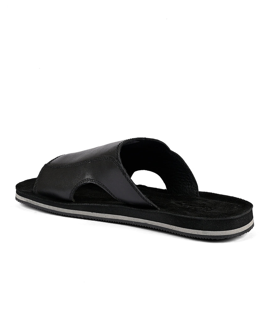 
                  
                    A single black full-grain leather Roan slip-on sandal on a white background.
                  
                