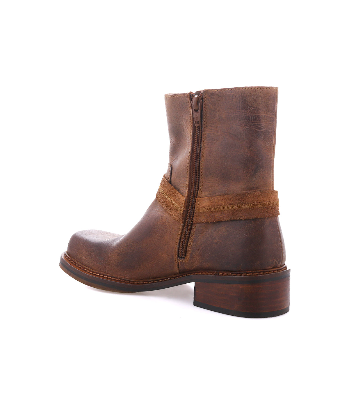 
                  
                    The Roan Bonsai is a brown full-grain leather ankle boot featuring a side zipper, low chunky heel, and visible stitching. Shown from the side against a white background, this style subtly channels classic moto boots with its sturdy construction and sleek design.
                  
                