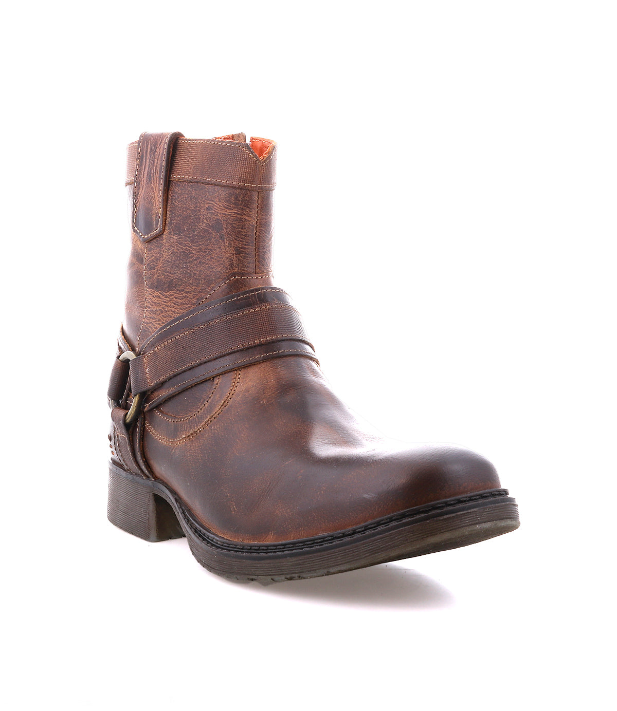 
                  
                    The Roan Colton II is a single brown leather combat boot with a low heel, buckle strap detail, side zipper, and a slightly worn finish, shown against a white background.
                  
                