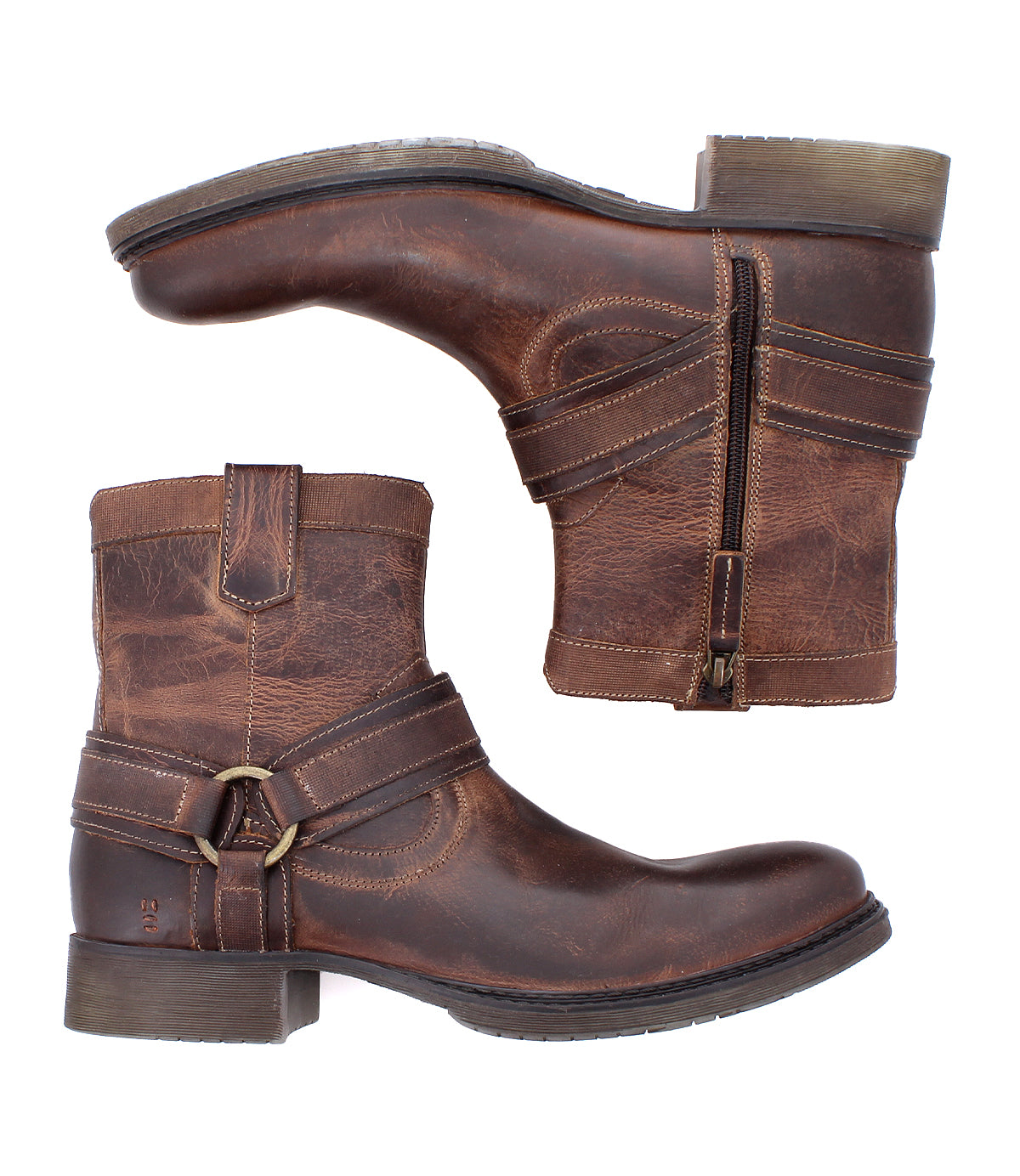 
                  
                    The Roan Colton II is a pair of brown leather ankle boots with side zippers, decorative straps, low heels, and subtle perforations, shown from the side and bottom views.
                  
                