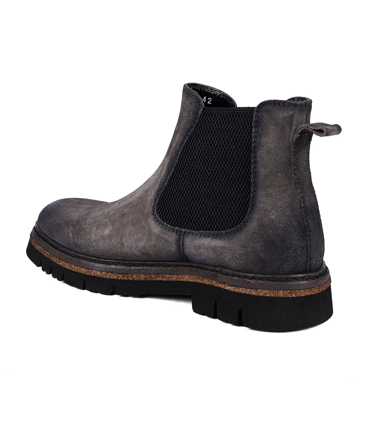 
                  
                    The Roan Defy Chelsea boot in gray features a textured black elastic side panel, a back pull tab, and a traction-friendly dark sole with meticulous hand-finishing.
                  
                