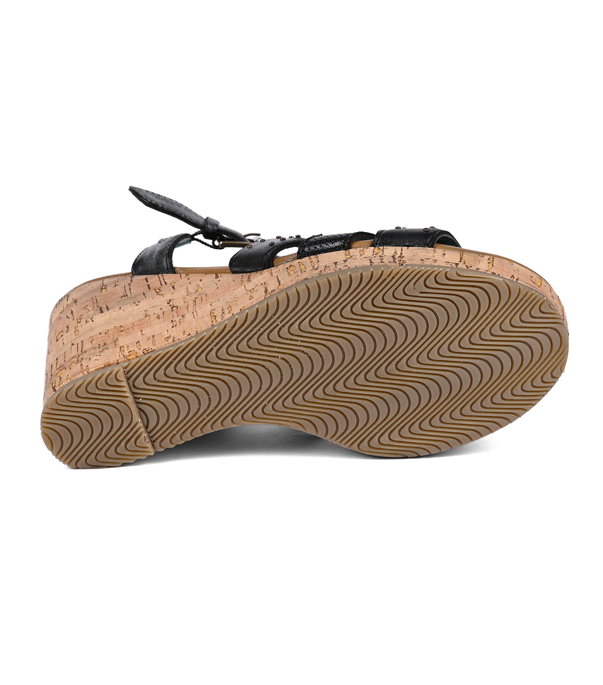 
                  
                    Side view of a Roan shoe featuring a cork midsole and a waved rubber outsole, with black upper laces on a white background. The shoe showcases a full-grain leather upper.
                  
                