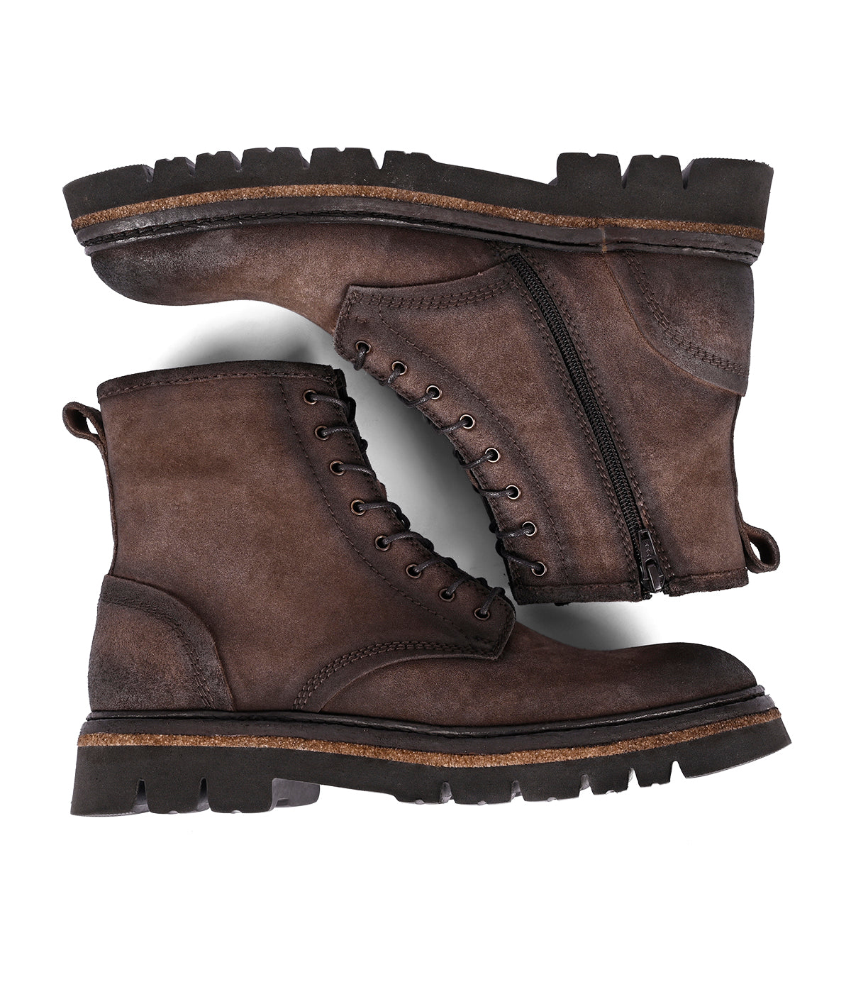 
                  
                    A pair of Roan's Duty boots in brown leather, featuring lace-up design with a padded insole and side zippers, perfectly complement their rugged soles when viewed from the side.
                  
                