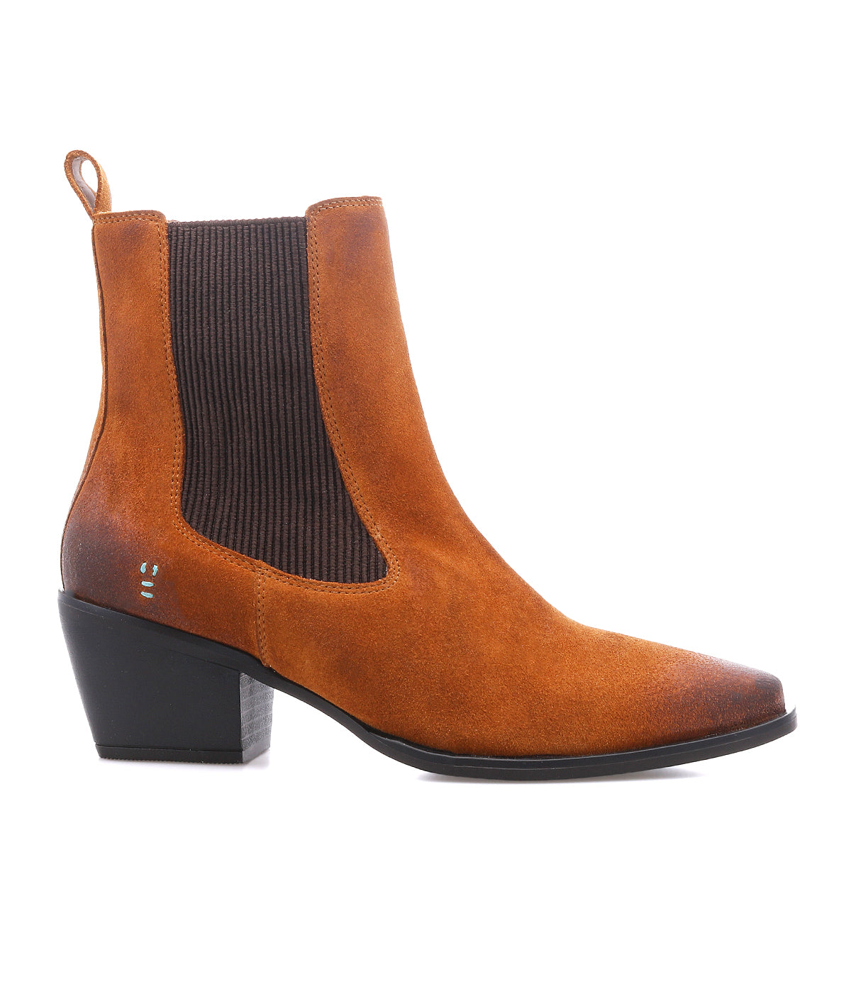 
                  
                    The Roan Dialgoue is a Chelsea-inspired brown suede ankle boot featuring a black elastic side panel, square toe, pull tab at the heel, and medium block heel, photographed on a white background.
                  
                