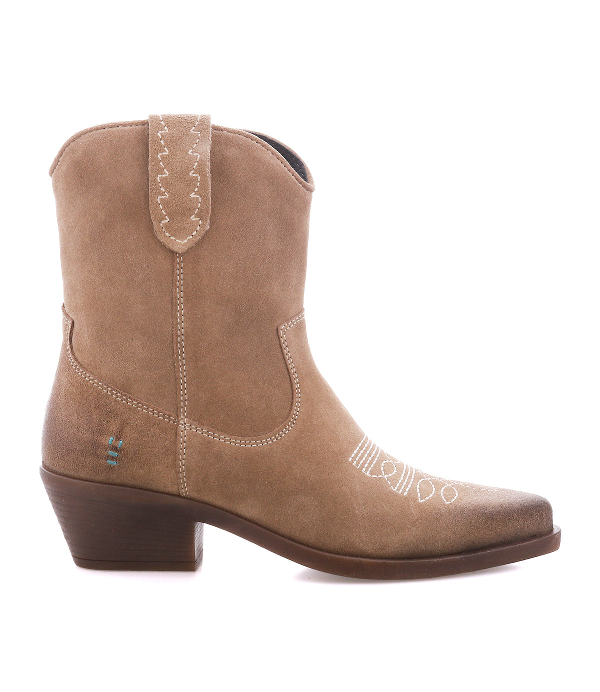 
                  
                    The Roan Discussion cowboy boot showcases a western attitude in soft tan suede, with a low stacked heel, pointed toe, decorative stitching on the pull strap, and side seam detailing—displayed from the side against a white background.
                  
                