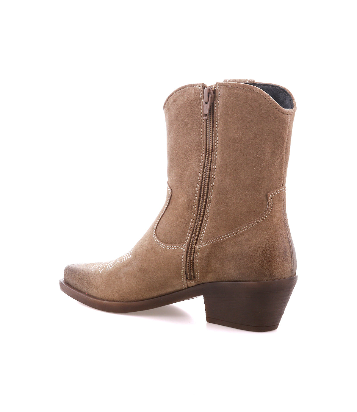 
                  
                    The Roan “Discussion” boot is a light brown soft suede ankle cowboy boot featuring a side zipper, pointed toe, and low angled heel, crafted to showcase authentic western attitude, shown on a white background.
                  
                