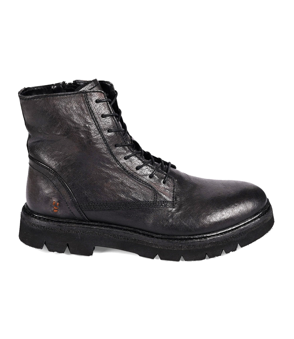 The Roan Diss is a black leather lace-up boot with a combat style, featuring a thick EVA outsole, visible stitching, and a convenient medial zipper for easy wear.