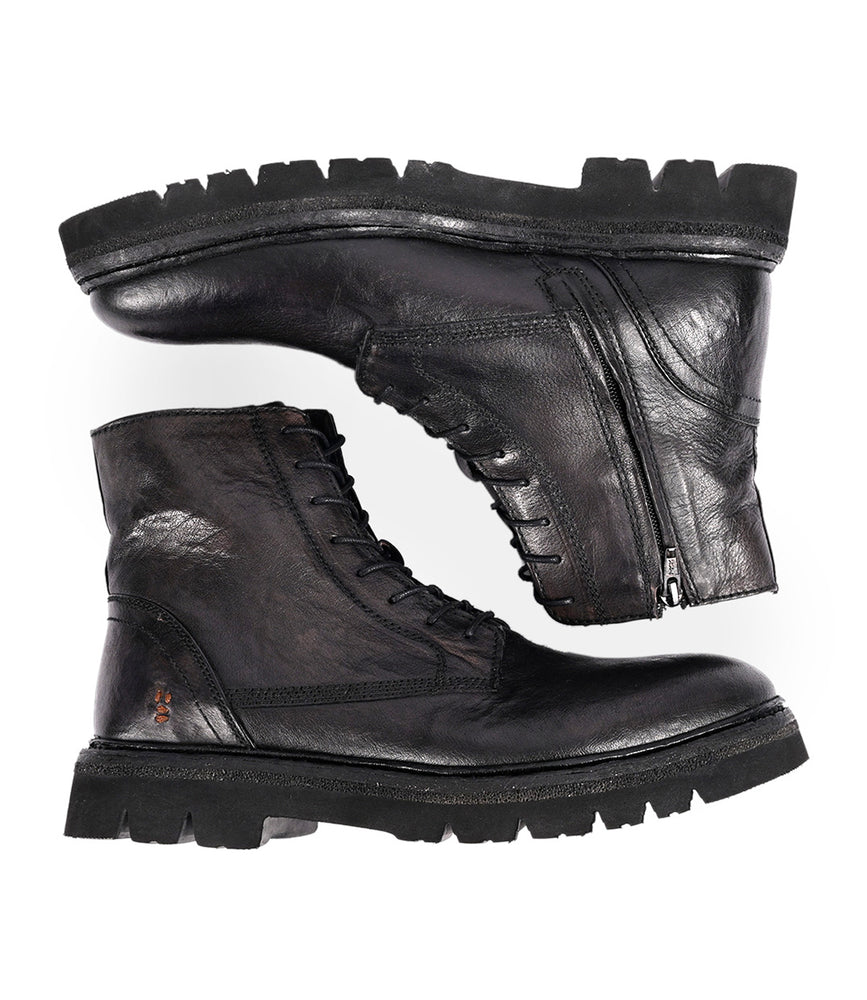 
                  
                    The Roan Diss boots are black leather combat-style lace-up footwear with medial zippers and an EVA outsole, displayed from the side and bottom views against a white background.
                  
                