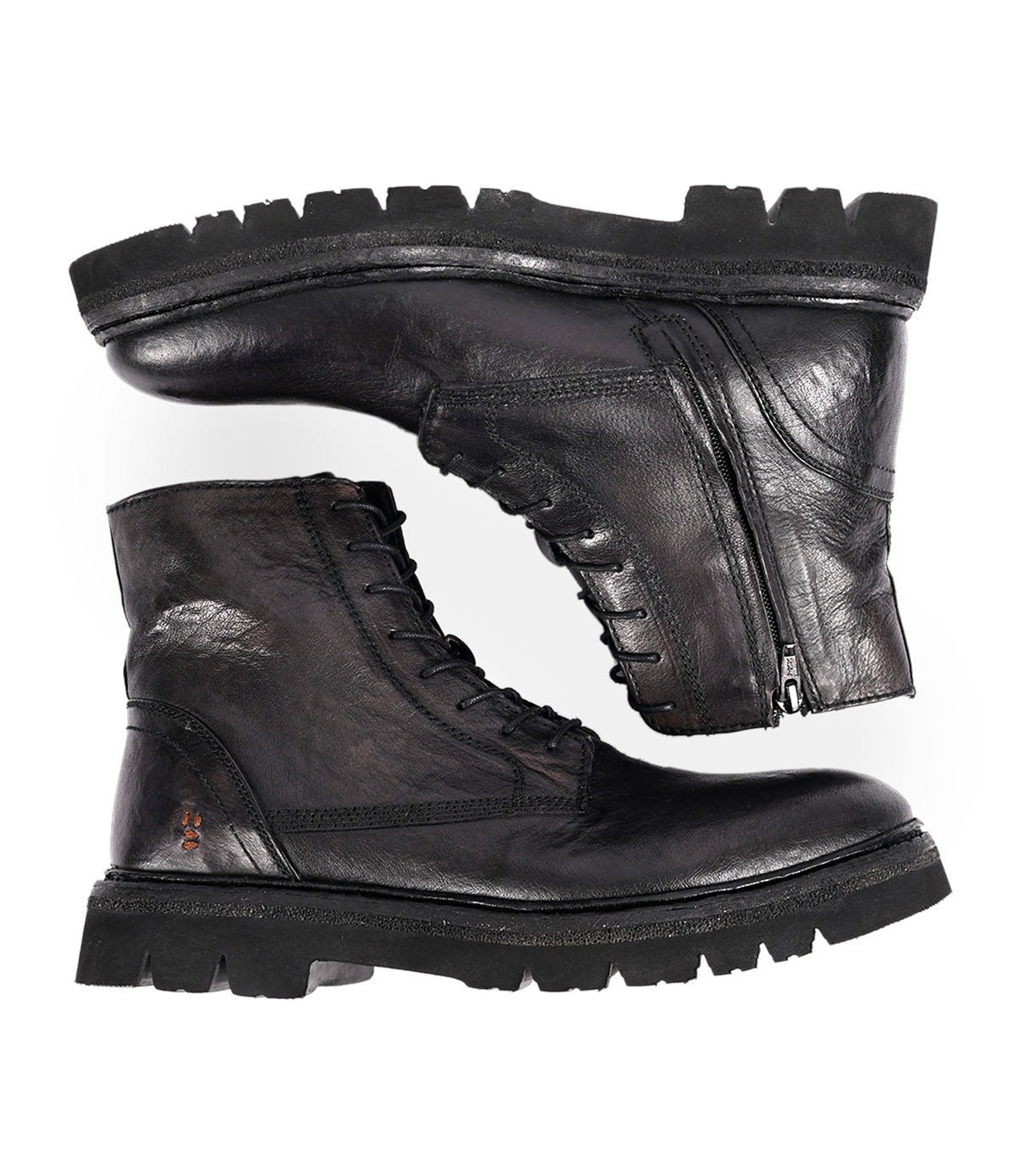 
                  
                    The Roan Diss boots are black leather combat-style lace-up footwear with medial zippers and an EVA outsole, displayed from the side and bottom views against a white background.
                  
                