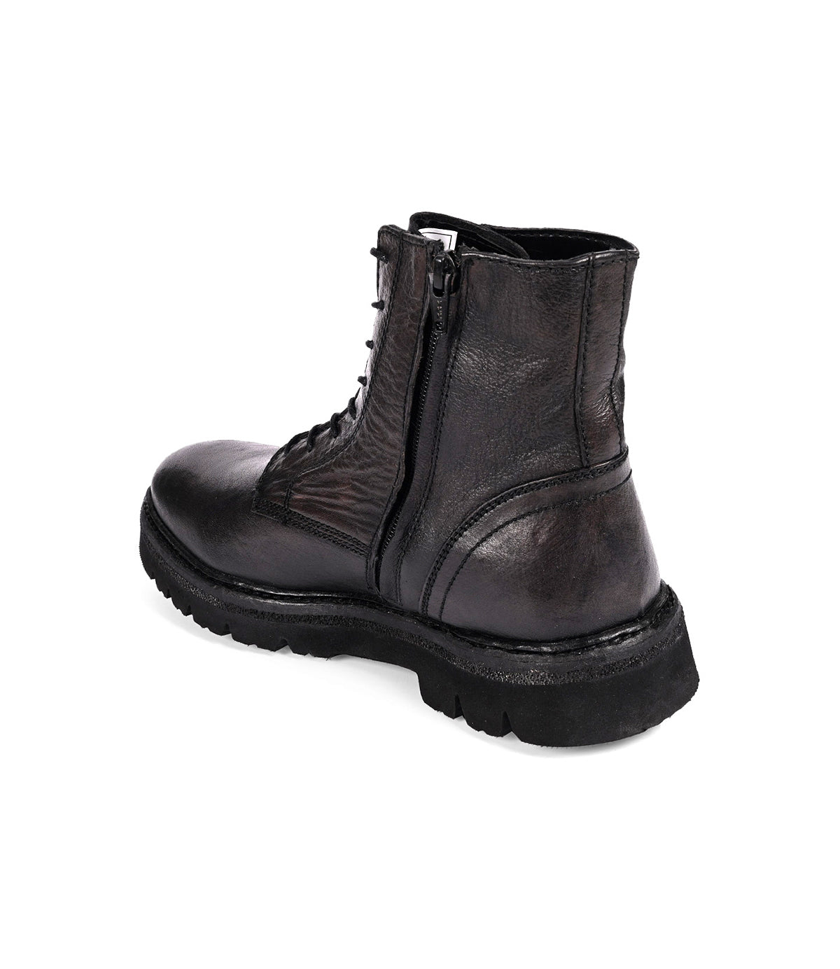
                  
                    The "Diss" by Roan is a black leather combat-style boot featuring laces, a medial zipper, and a chunky EVA outsole.
                  
                