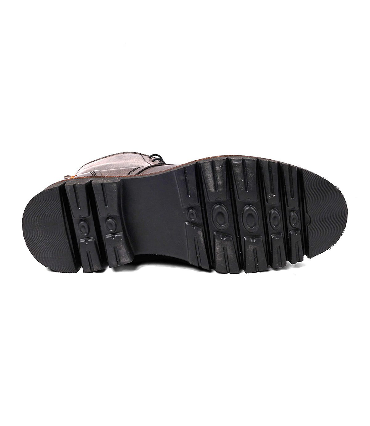 
                  
                    Bottom view of the Roan Duty suede boot with a black rubber sole featuring patterned treads for grip and traction, plus a side zipper for easy wear, shown against a white background.
                  
                
