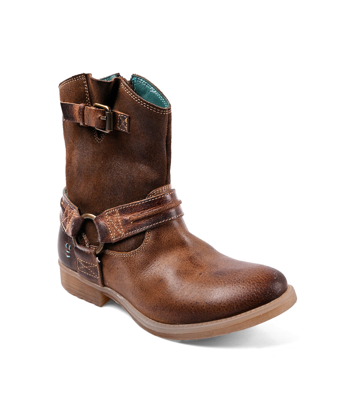 The Roan Flair is a brown leather ankle boot with decorative straps, Western stitching, a low heel, and side buckle detail, shown against a white background.