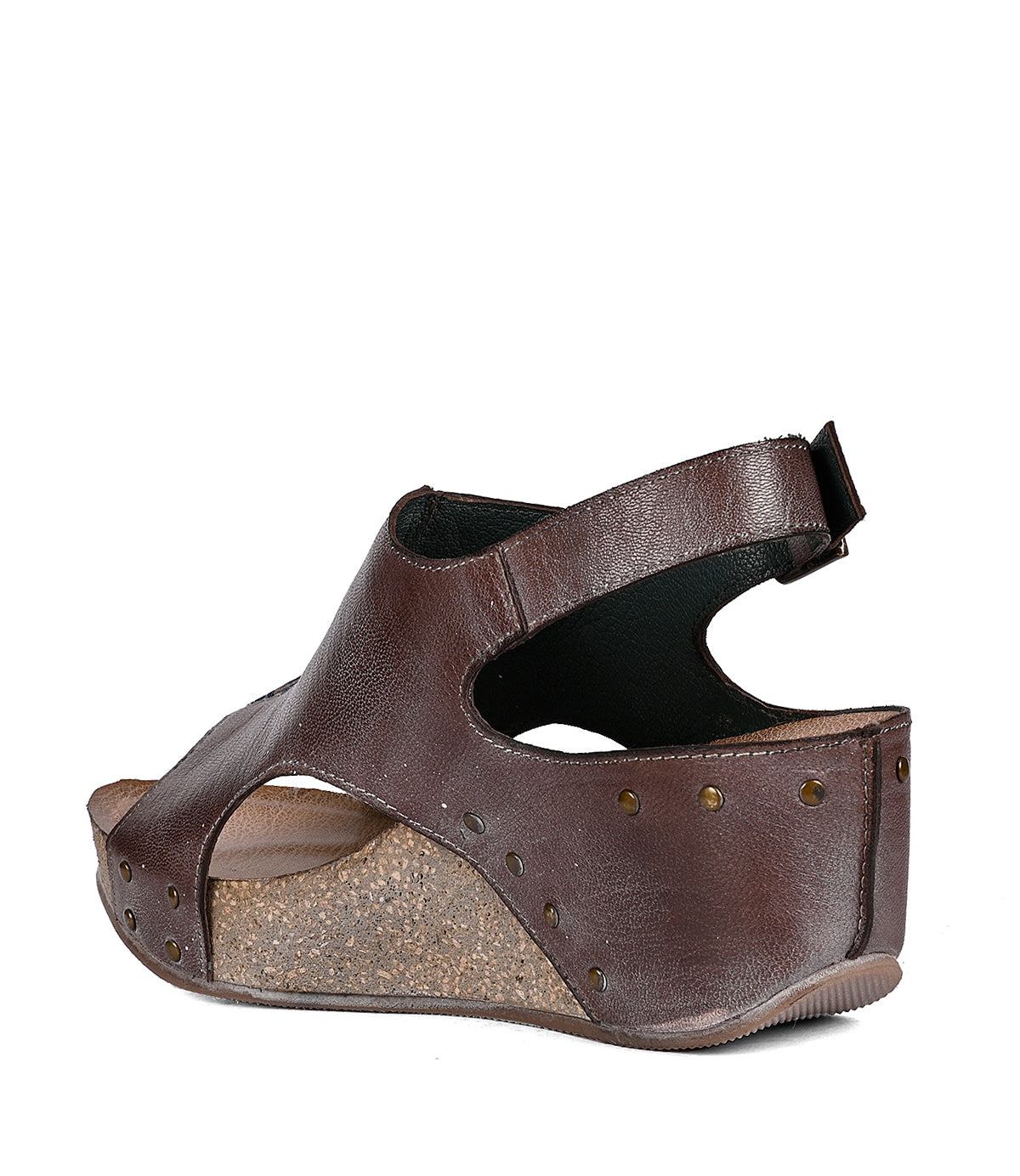 
                  
                    Brown full-grain leather wedge sandal with open toe and heel, cork platform, and studs detailing isolated on a white background. (Fortnight by Roan)
                  
                