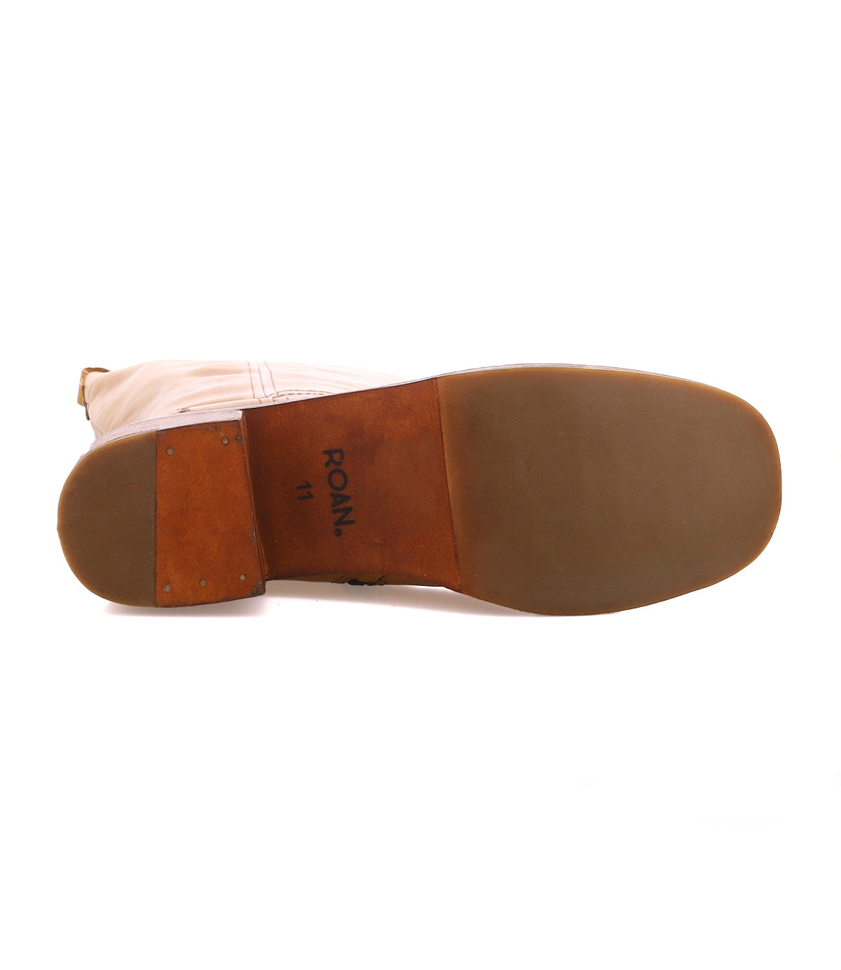 
                  
                    A tan dress shoe from Roan’s Froe collection is shown from the bottom, featuring a smooth sole with “FROE 11” printed near the heel and contrast stitching visible on the upper, which is crafted from premium full-grain leather.
                  
                