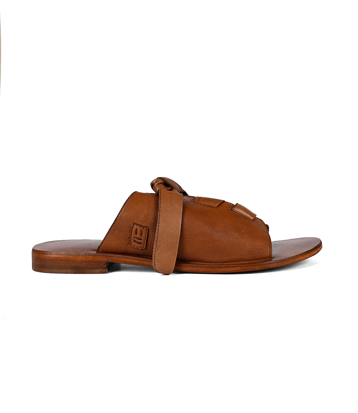 
                  
                    Luxury Roan Grapevine leather sandal on a white background.
                  
                