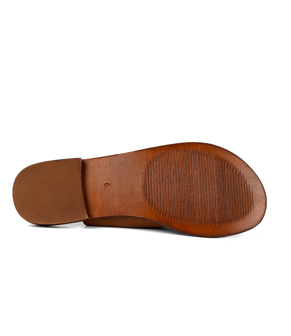 
                  
                    Sole of a Roan Grapevine brown, textured leather outsole against a white background.
                  
                