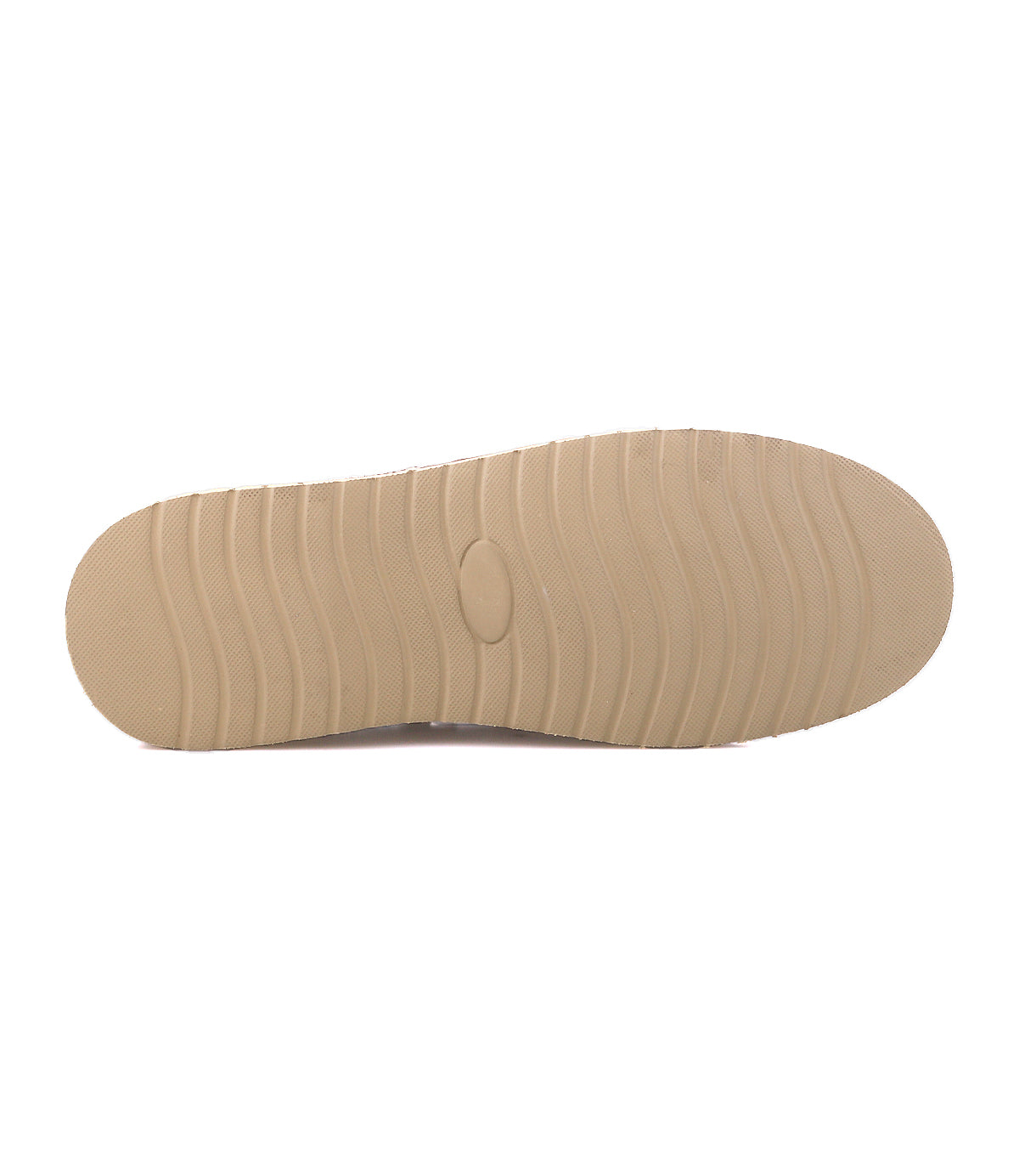 
                  
                    The Roan Glory suede boat shoe features a tan rubber sole with horizontal grooves and an oval-shaped center indentation, shown here from the bottom view.
                  
                