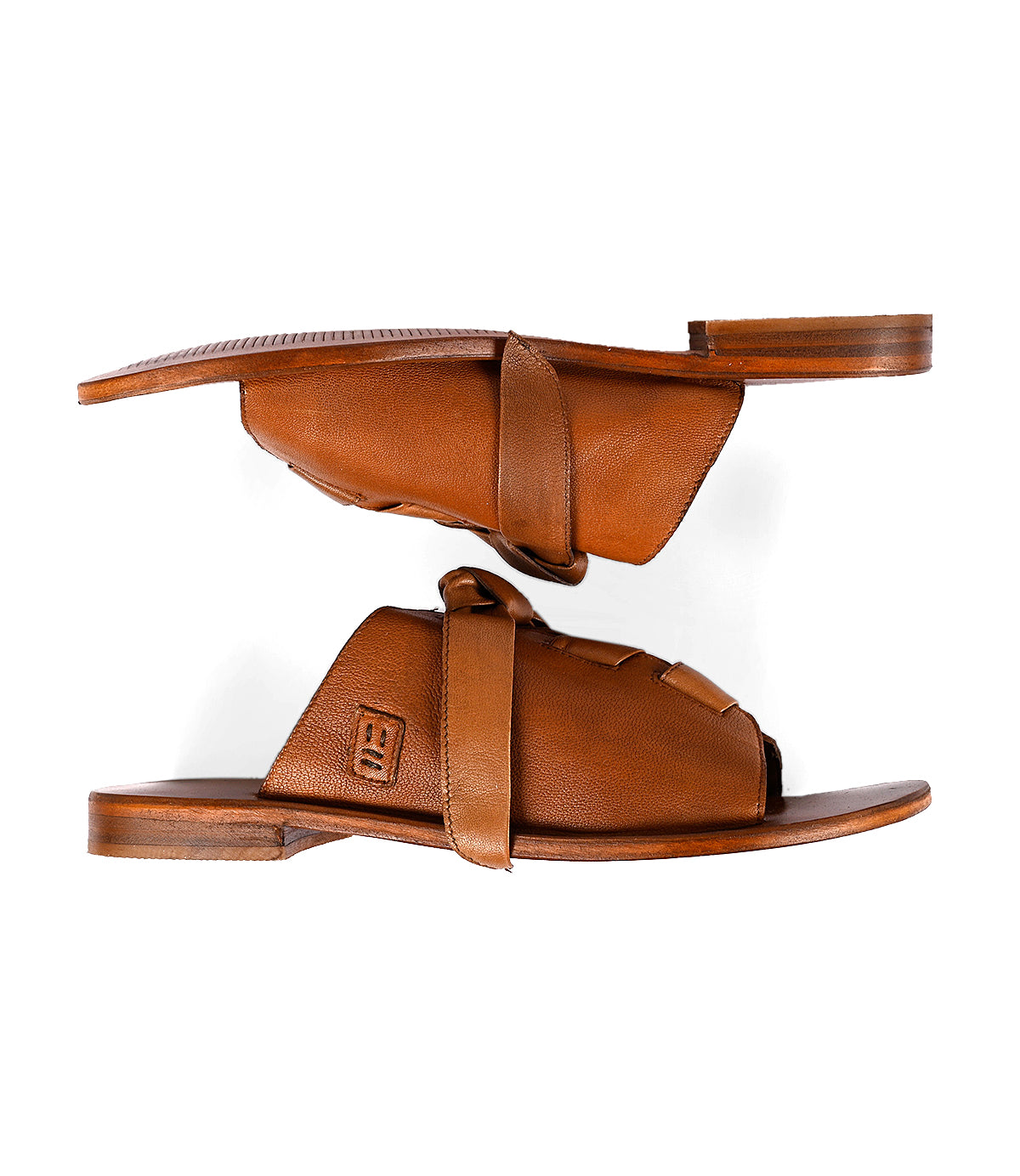 
                  
                    A pair of Roan Grapevine luxury leather sandals displayed against a white background.
                  
                
