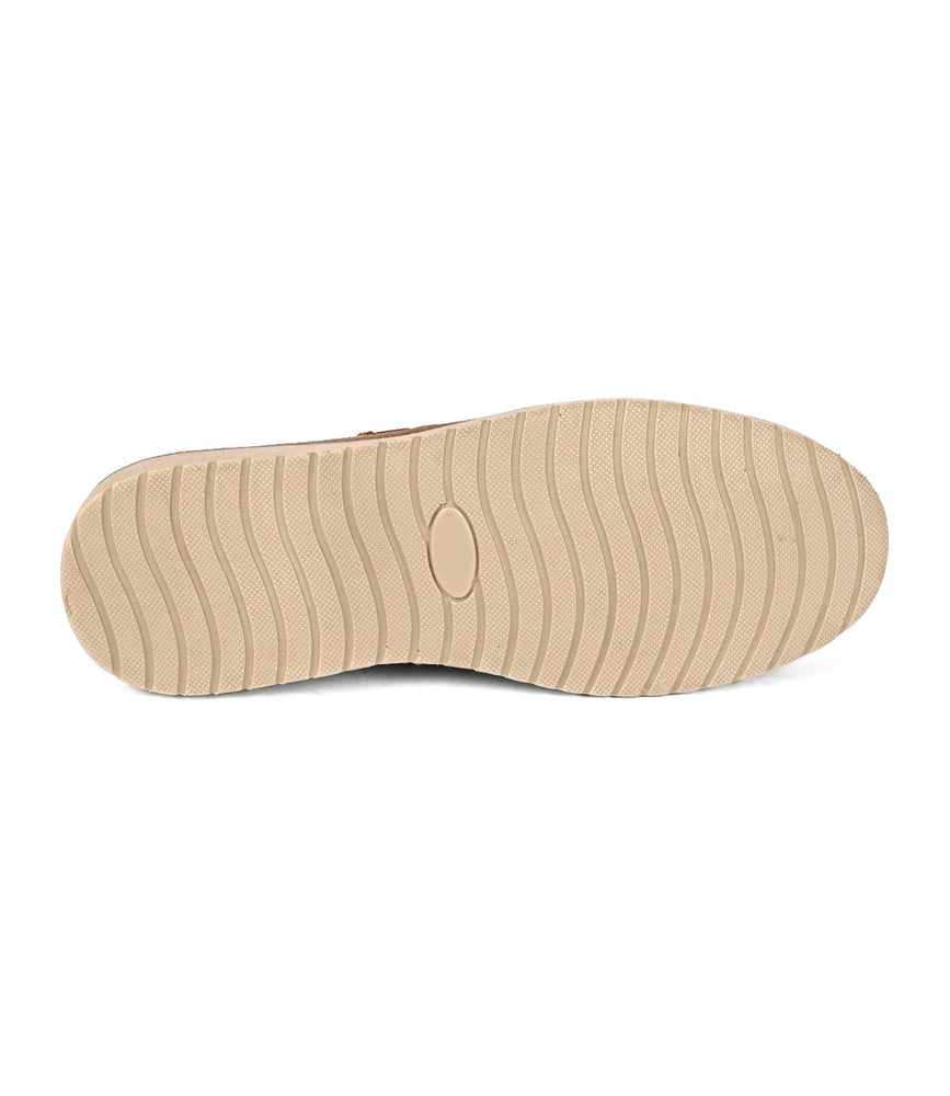 
                  
                    The Roan Grid features a beige sole with a wavy tread and oval center, designed for enhanced grip and comfort—ideal for your favorite suede penny loafer.
                  
                