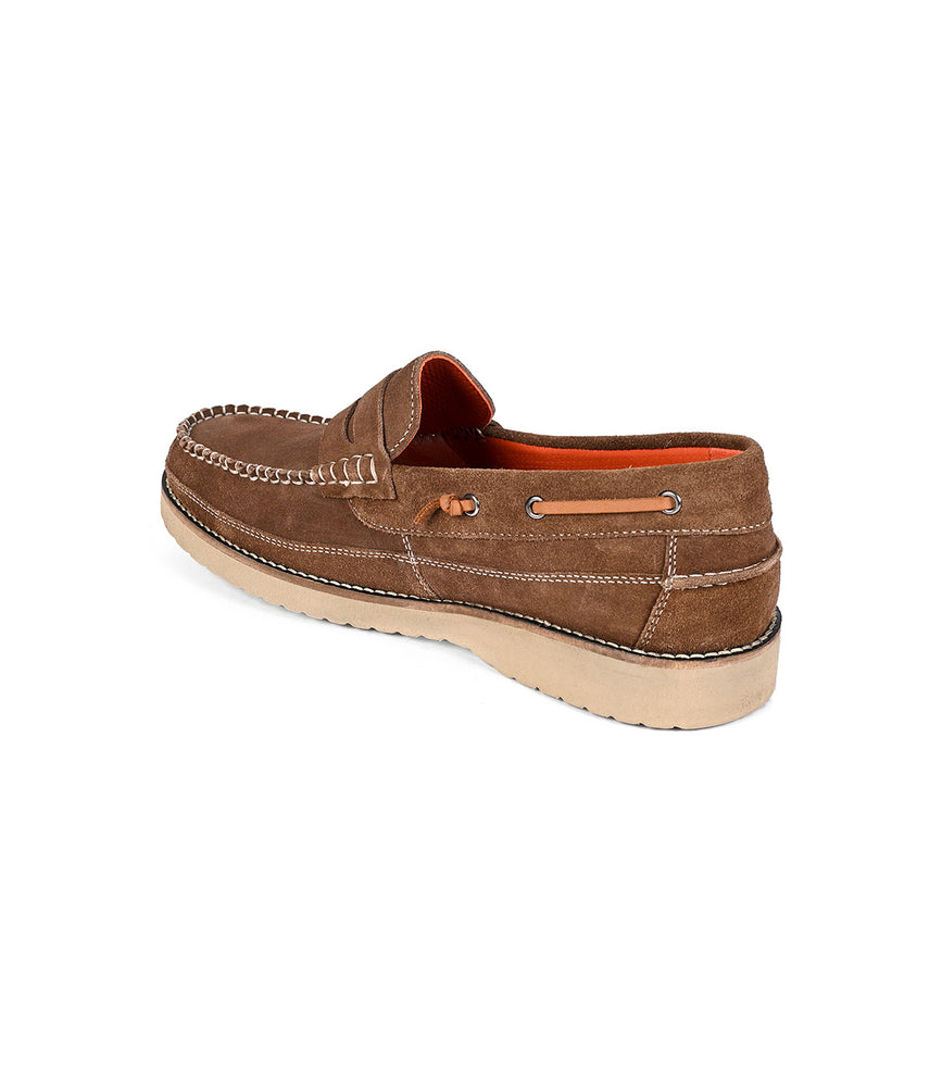 
                  
                    The Roan Grid is a brown suede penny loafer with white stitching, decorative laces, orange lining, cushioned insole, and light rubber sole—an ideal casual shoe shown from the back.
                  
                