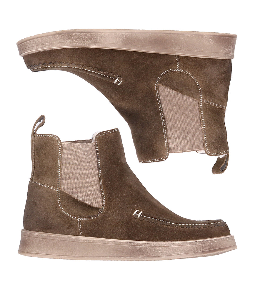 
                  
                    The Roan Heap is a brown suede Chelsea boot featuring a suede upper, beige elastic side panels, and stitching—shown from side and bottom views—making it an ideal casual slip-on.
                  
                