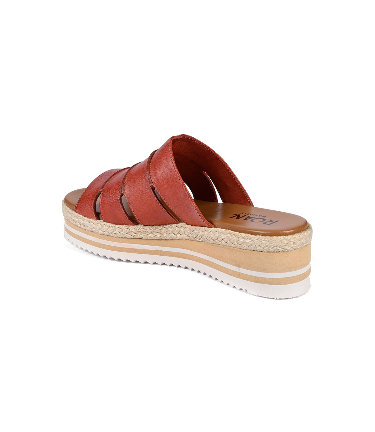
                  
                    The Incant by Roan is a brown wedge sandal featuring leather crisscross straps, a braided rope midsole, and a white serrated rubber sole that exudes boho-chic charm.
                  
                