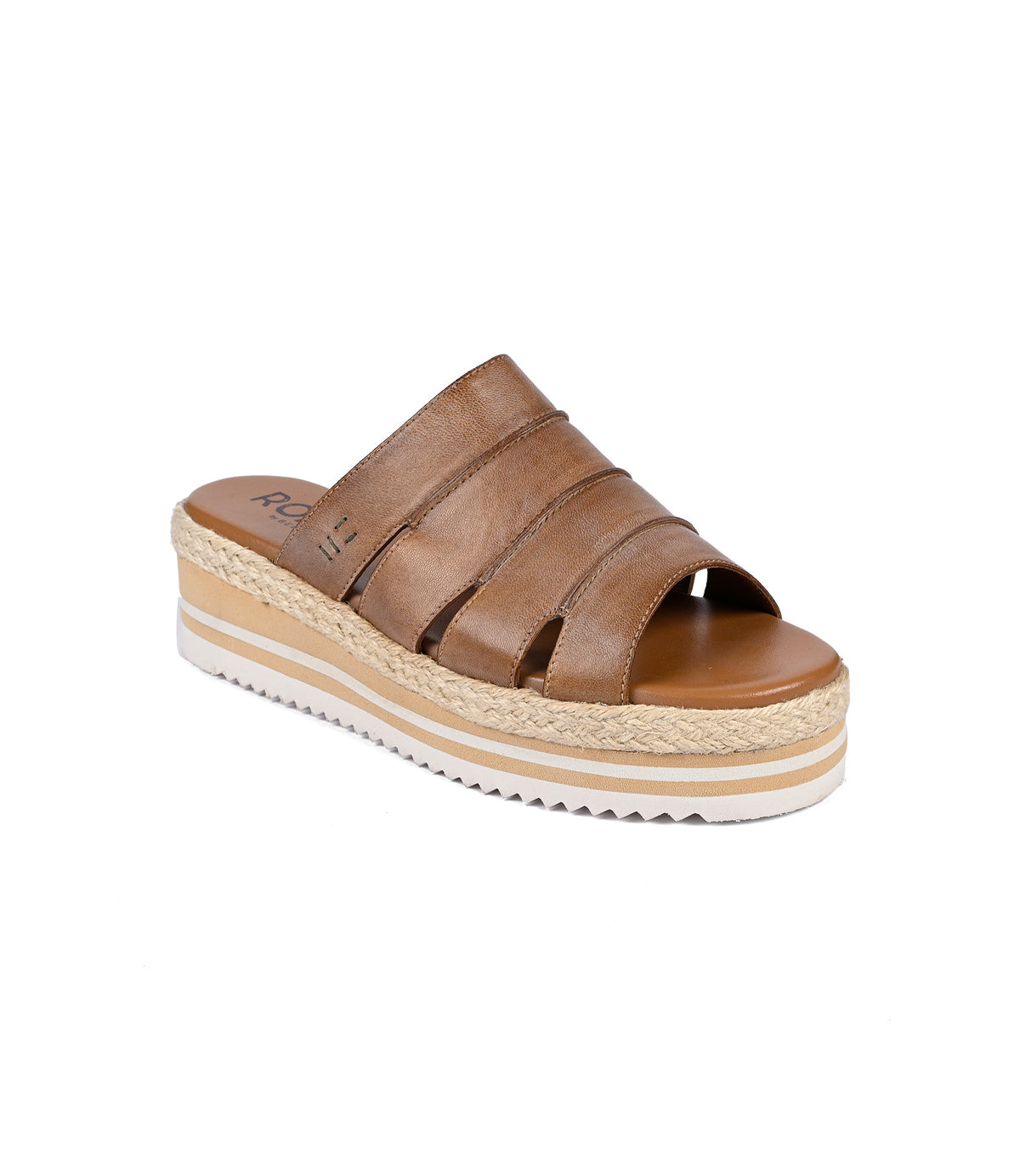 
                  
                    The Incant by Roan exudes boho-chic charm with its brown leather platform slide design, featuring three horizontal straps and a white textured bottom.
                  
                