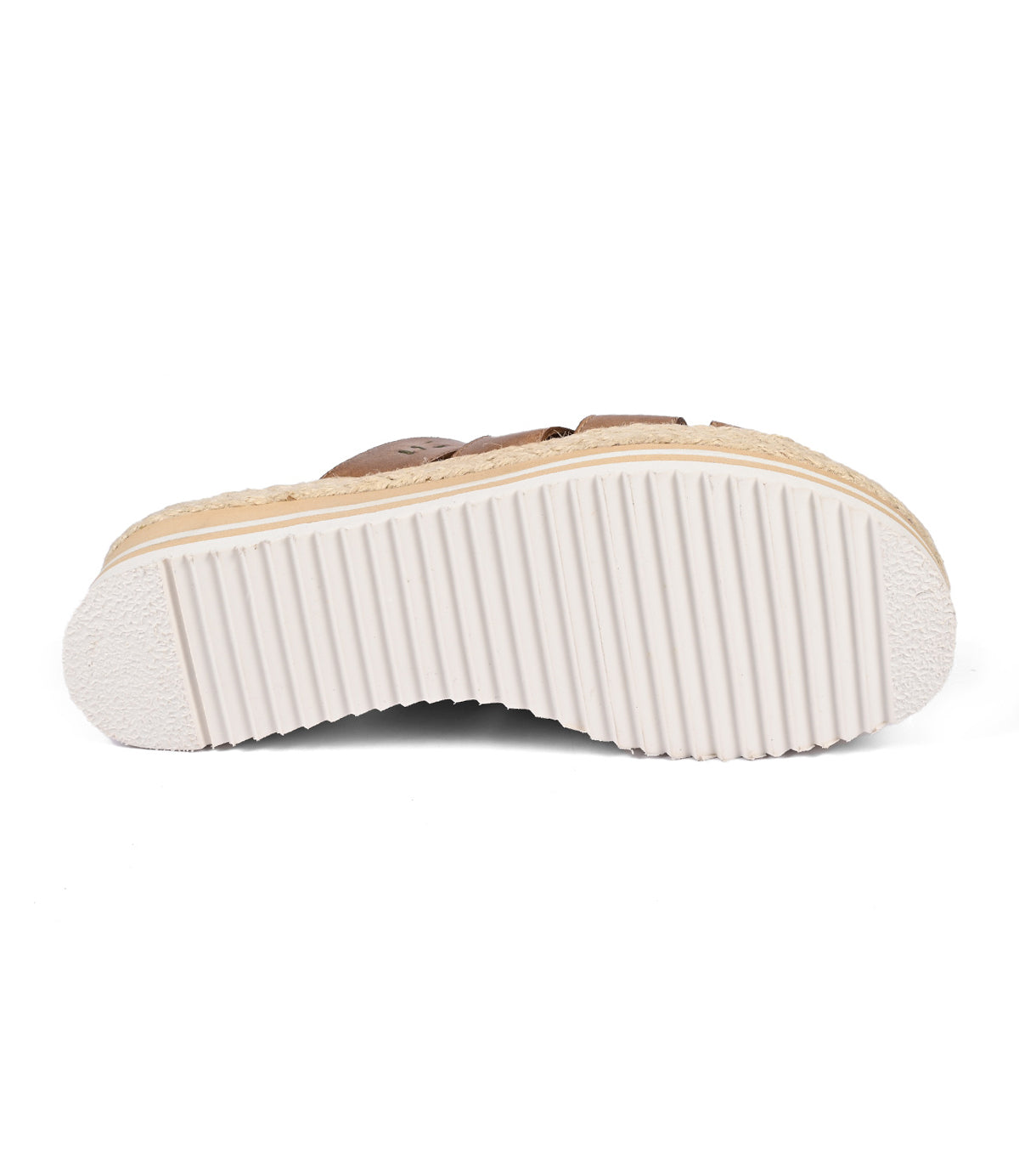 
                  
                    The Incant platform slide sandal by Roan features a boho-chic sole with a textured, ribbed pattern in a white and tan design.
                  
                