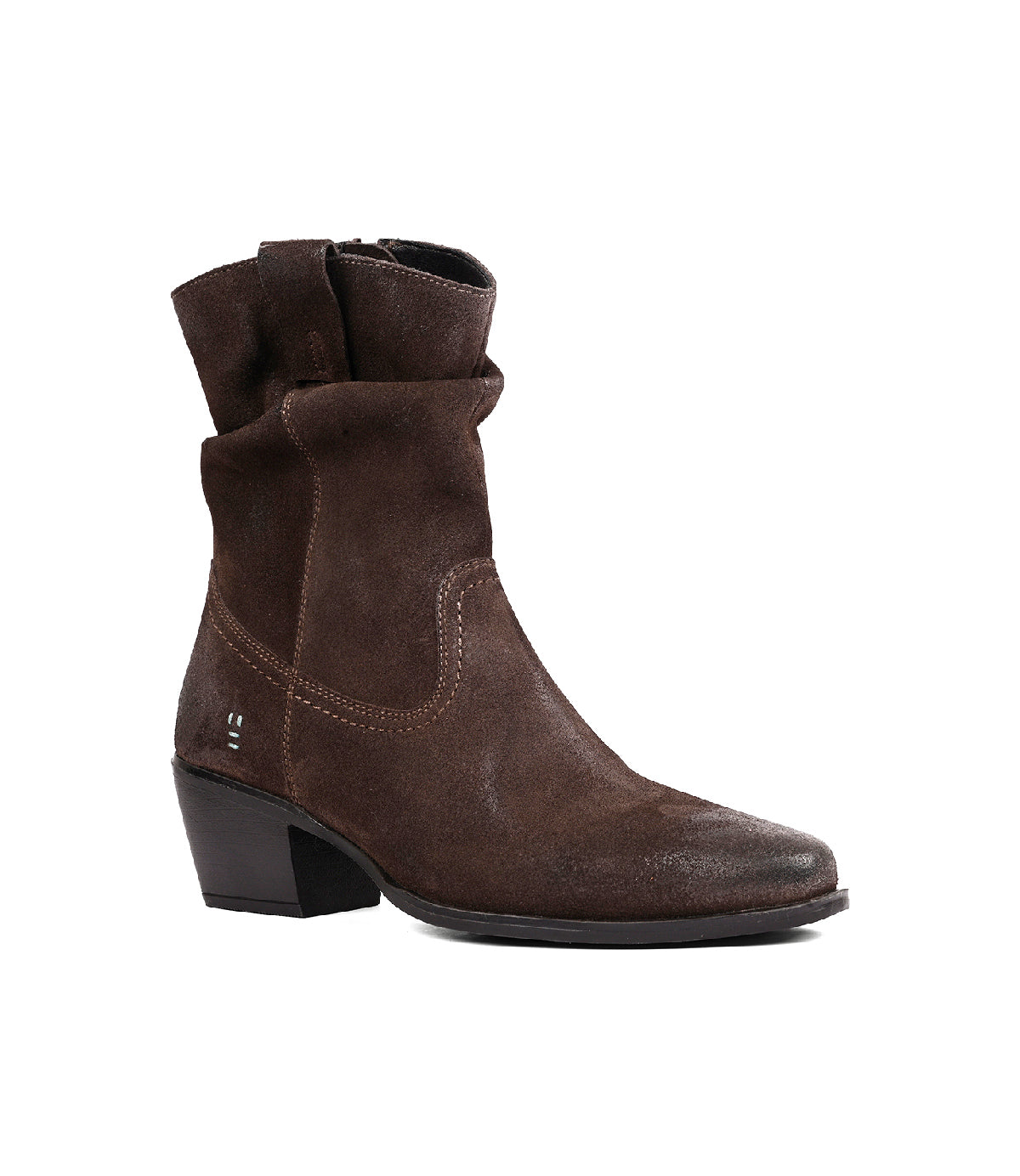
                  
                    The Roan “Interaction” ankle boot is shown photographed on a white background, featuring soft suede in a slouchy silhouette, a mid-height block heel, visible stitching details, and a slightly relaxed shaft.
                  
                