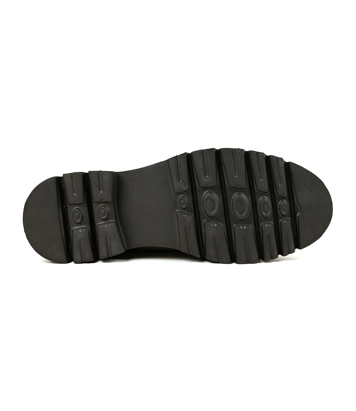 
                  
                    The image shows the black rubber treaded sole of the Roan Kickoff suede chukka boot, viewed from underneath, featuring grooves and circular patterns for enhanced grip.
                  
                