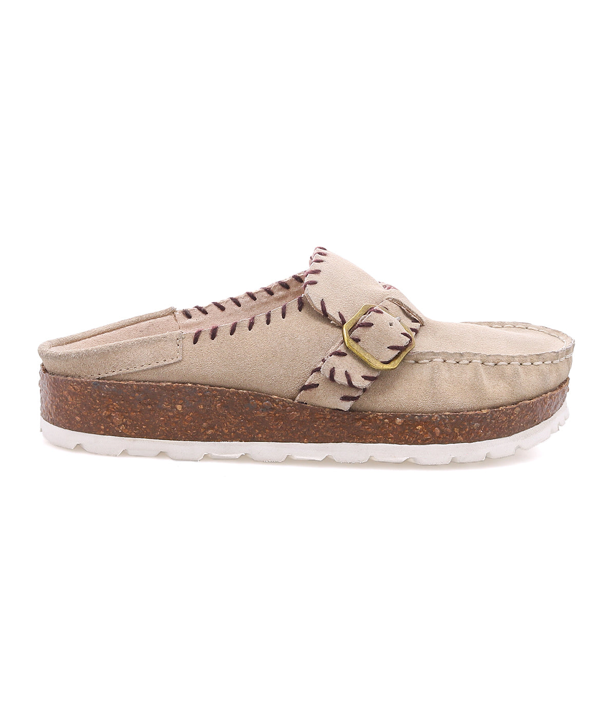 
                  
                    The Roan Mingle is a beige slip-on clog in plush suede, accented with brown stitching, a decorative gold-tone buckle, a chunky cork-wrapped platform sole, and a white treaded outsole, shown from the side.
                  
                