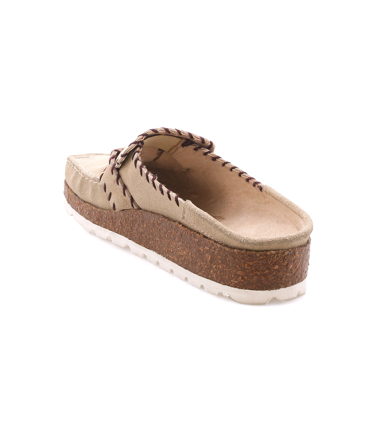 
                  
                    Roan Mingle slip-on shoe in tan plush suede, featuring a chunky cork-wrapped sole, white tread, and braided leather lace detail, shown from the back and slightly above.
                  
                