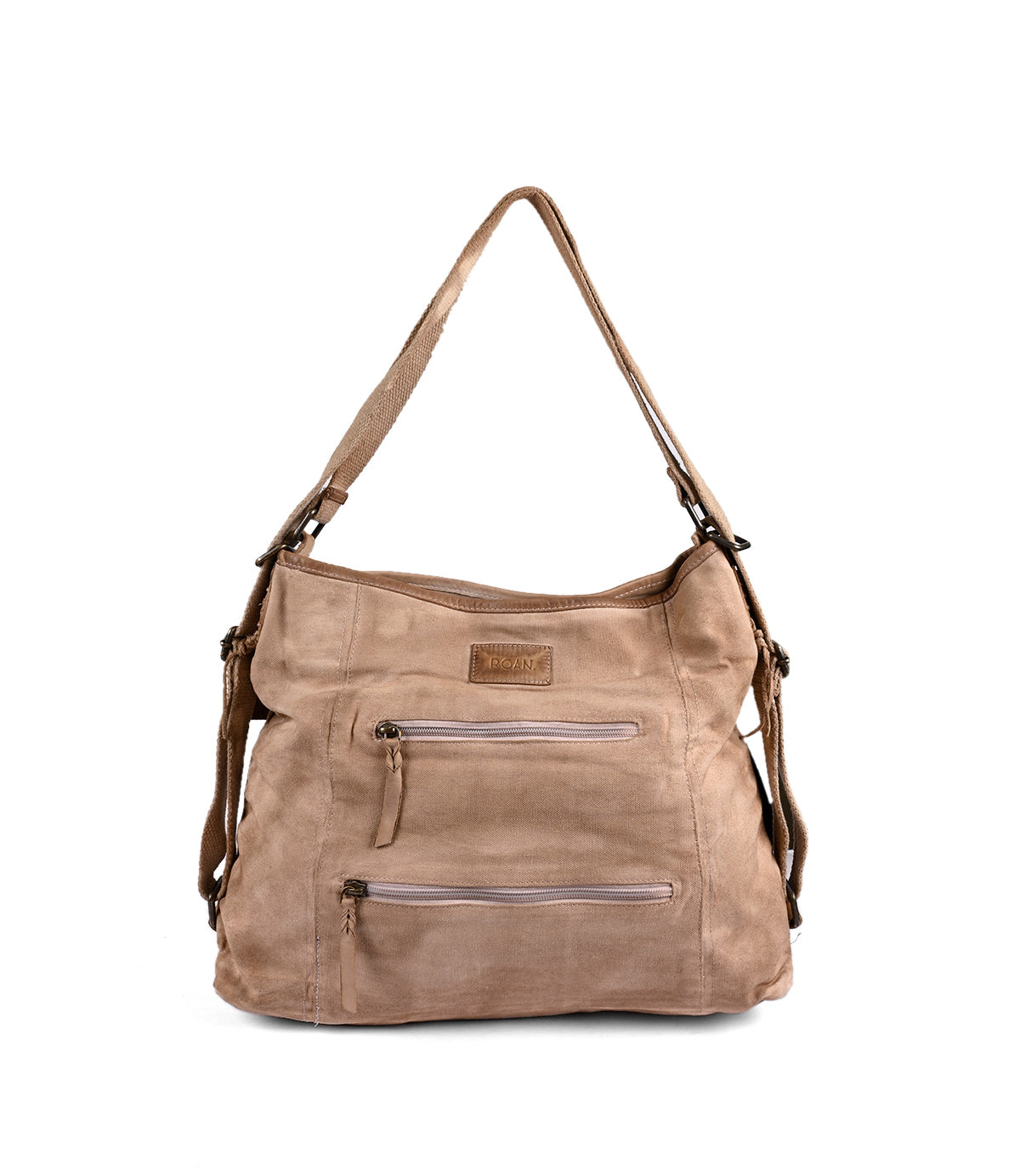 The Oganness by Roan, a versatile brown suede shoulder bag featuring two front zipper pockets and an adjustable strap, is showcased against a white background, making it the perfect travel companion.
