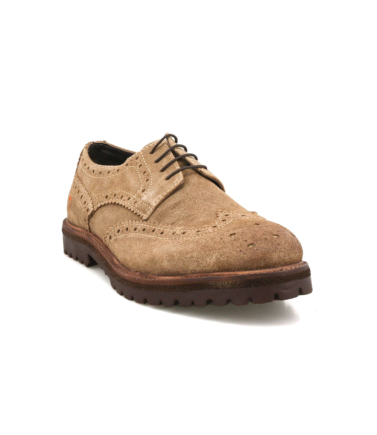 
                  
                    The Roan Phiz is a tan suede wingtip brogue derby featuring decorative perforations, dark brown laces, and a chunky lug sole, shown angled on a white background.
                  
                