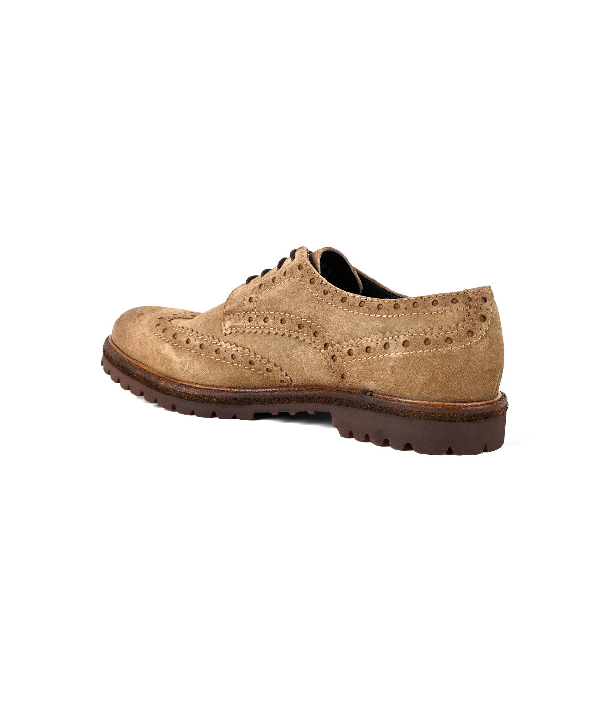 
                  
                    The Roan Phiz is a tan suede wingtip brogue derby with decorative perforations, dark brown laces, and a chunky lug sole—an elevated twist on classic men’s dress shoes, shown against a white background.
                  
                