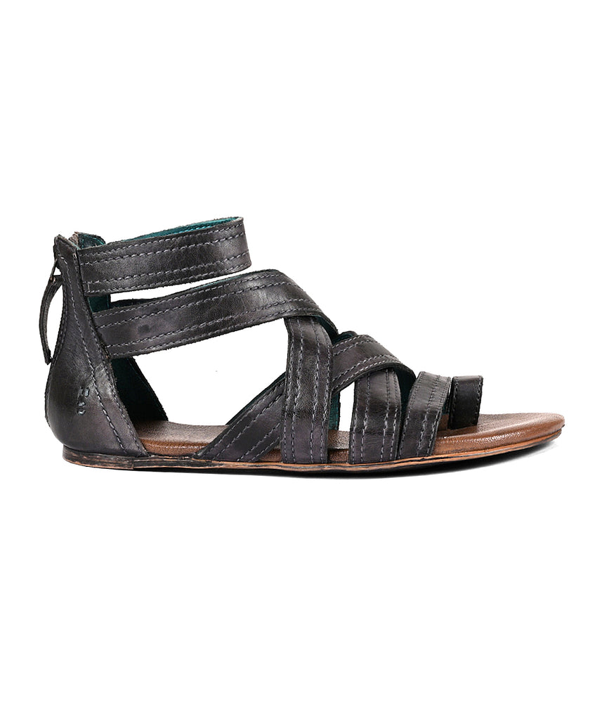 
                  
                    A women's black leather sandal with straps and a cushioned footbed, the Royalty sandal by Roan.
                  
                