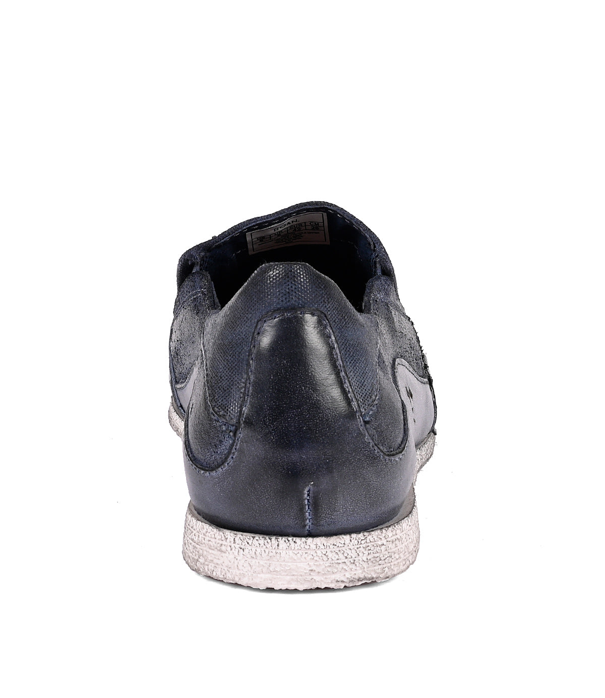 
                  
                    A single black, leather slip-on sneaker named Shevon photographed from the back view against a white background. Brand name: Roan
                  
                