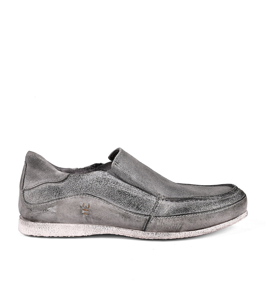 
                  
                    Single gray leather Shevon slip-on loafer shoe displayed against a white background by Roan.
                  
                