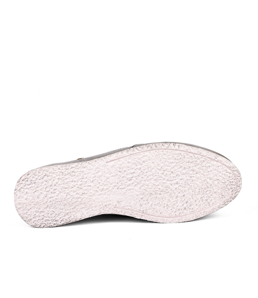
                  
                    Sole of a Roan Shevon leather slip-on shoe against a white background.
                  
                