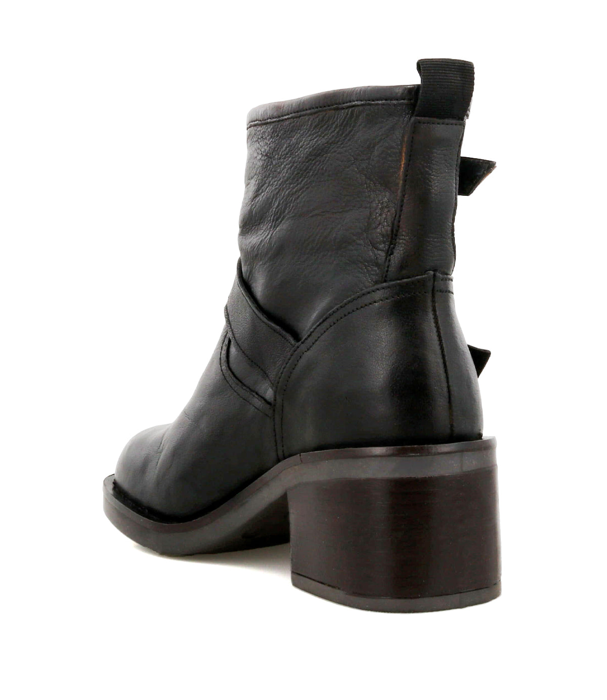 
                  
                    The Spry ankle boot by Roan features hand-finished black leather, a chunky brown heel, double buckle straps, pull tabs at the back, and visible stitching details—shown here from the rear side angle.
                  
                