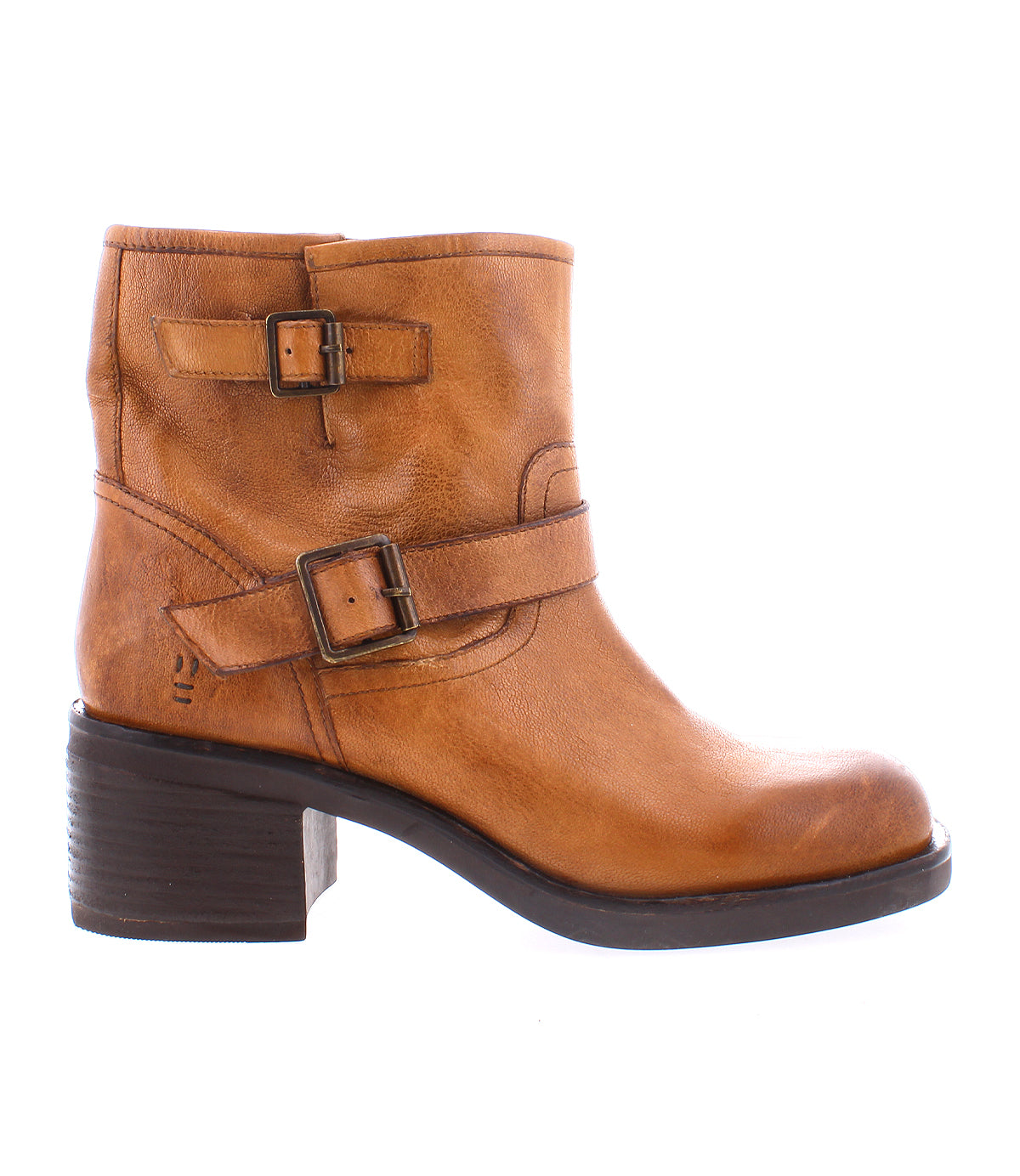 
                  
                    The Spry by Roan is a brown moto-inspired ankle boot crafted in hand-finished leather, featuring a double buckle strap and chunky low heel, shown in right-facing profile.
                  
                
