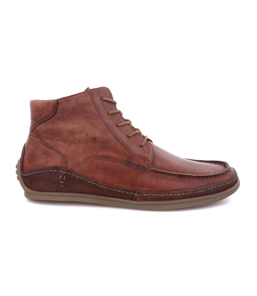 
                  
                    A single brown full-grain leather Syr ankle boot with laces isolated on a white background.
                  
                