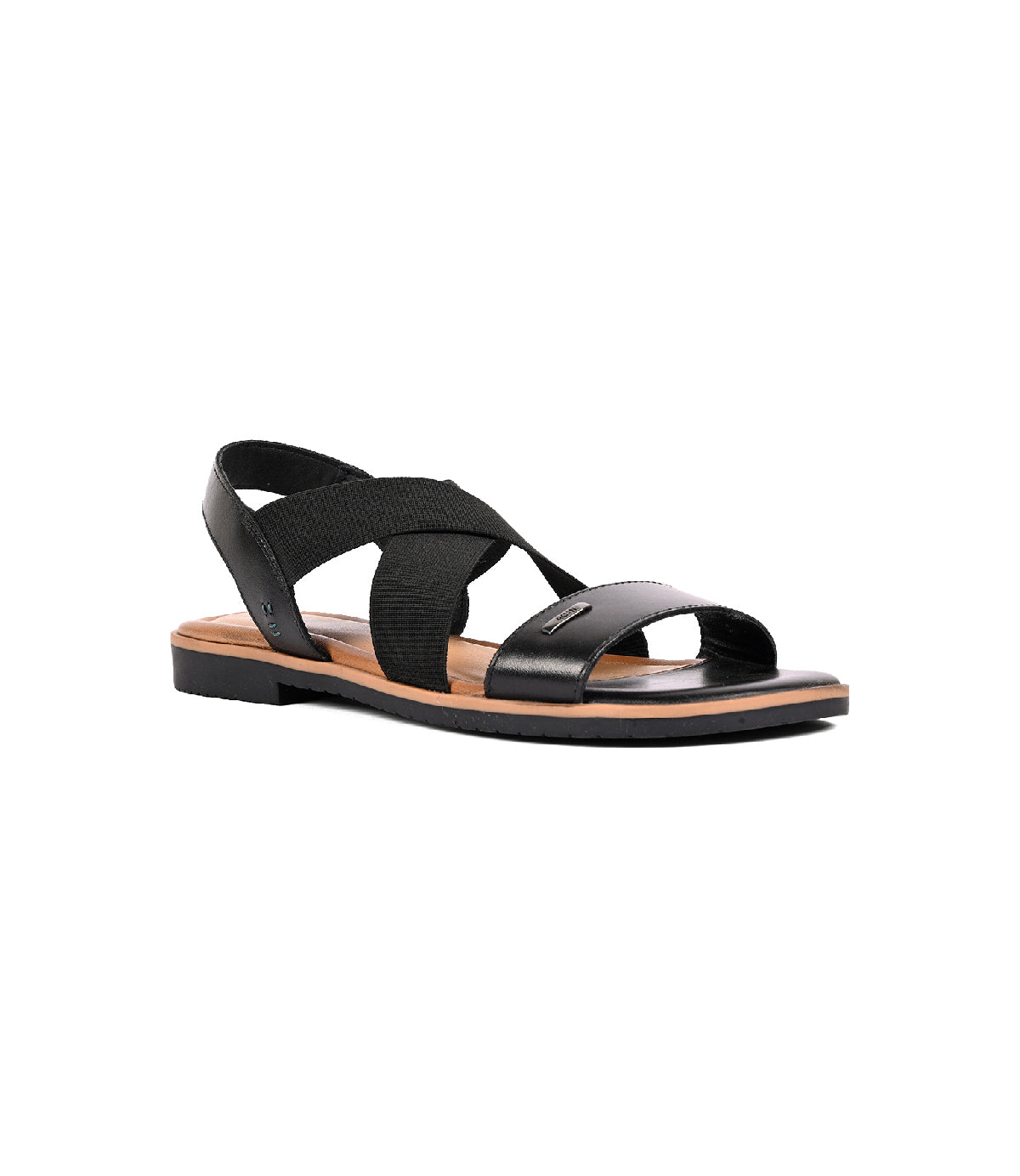 The Theodora by Roan is a black leather sandal with an open toe, elastic crossover straps, a low heel, and flat sole for comfortable fit, shown on a white background.