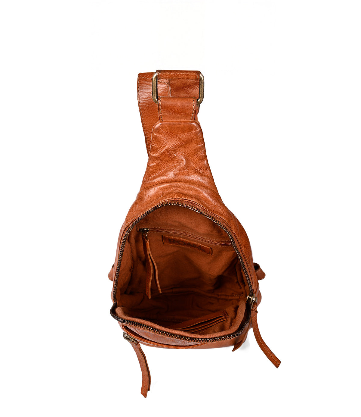 
                  
                    The Roan Trickle is a brown leather crossbody bag featuring a main zip compartment with a fabric-lined interior and inner zip pocket—an ideal compact choice for everyday versatility.
                  
                