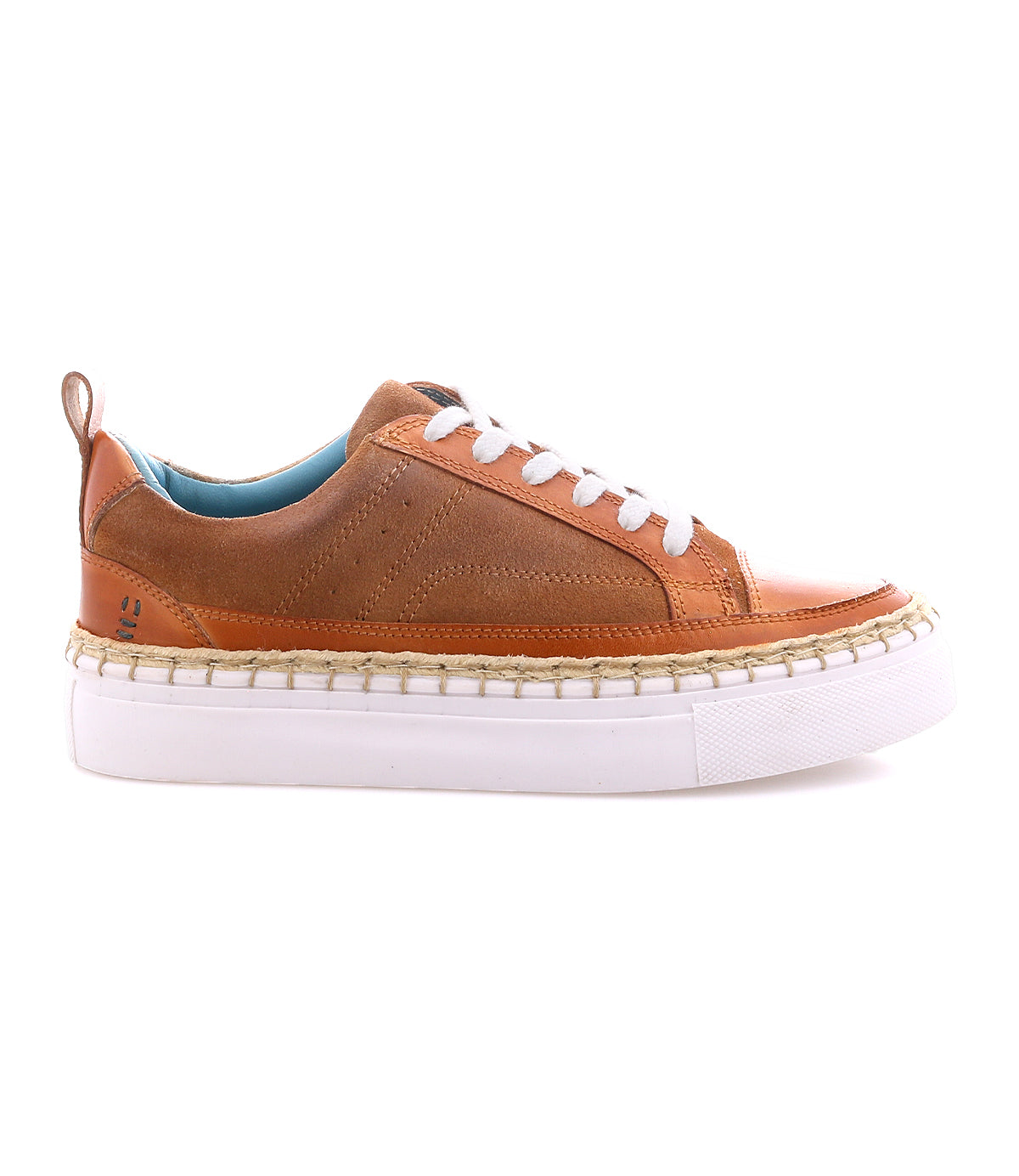 The Roan Void sneakers feature brown leather with mixed textures, white laces, a blue cushioned interior, and a thick white rubber sole accented by a subtle jute-wrapped edge, shown here in a side profile view.