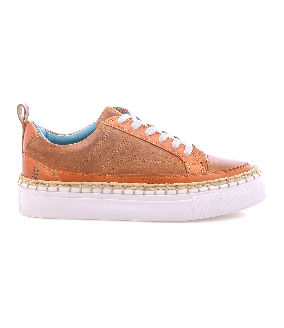 The Roan Void sneaker is shown in side profile, featuring tan leather, white laces, a light blue inner lining, and a thick white rubber sole with a jute-wrapped edge.