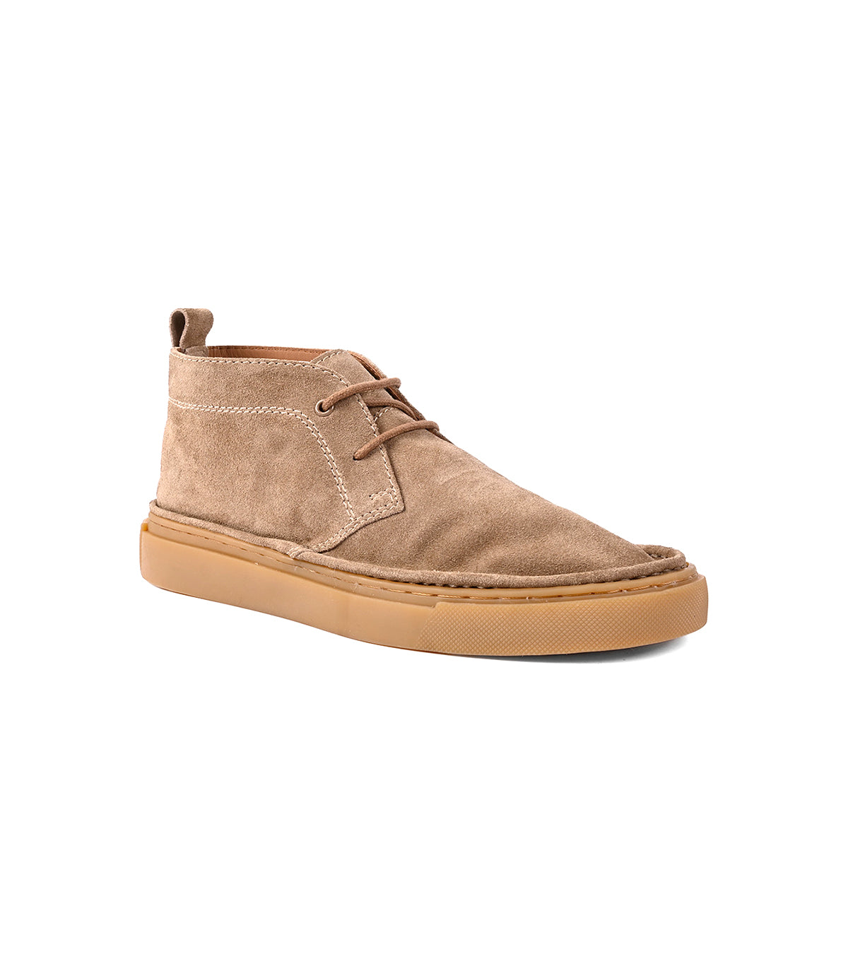 
                  
                    The Roan Volunteer chukka boot features a tan suede upper with brown laces, a convenient pull tab at the heel, and a light brown sneaker-style rubber sole, displayed on a white background.
                  
                